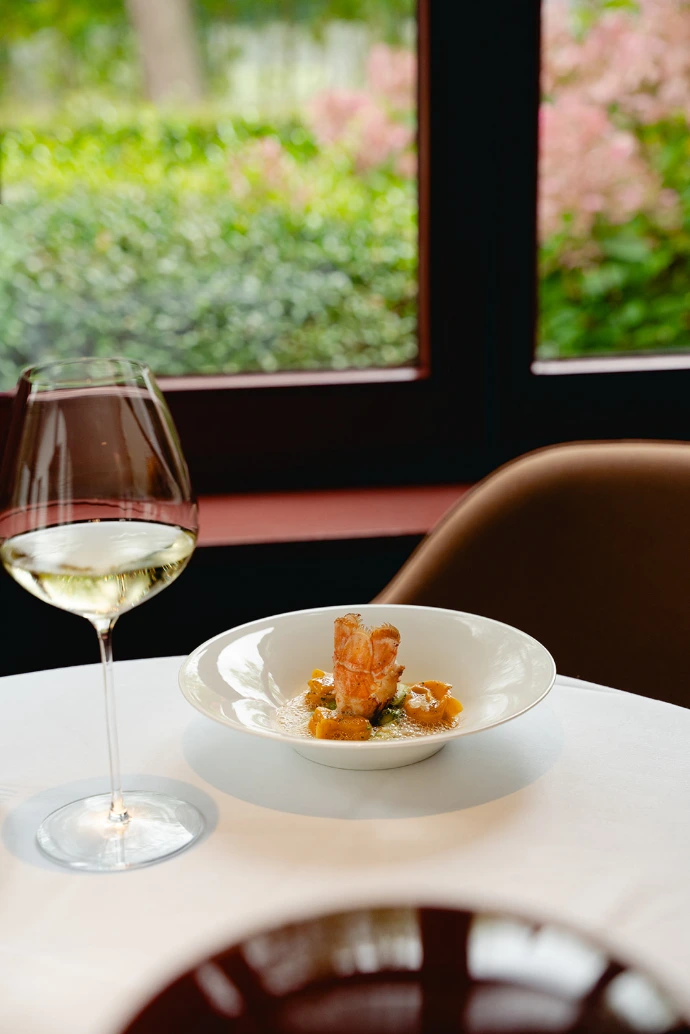 A glass of wine at the table at Brabohoeve in Schilde