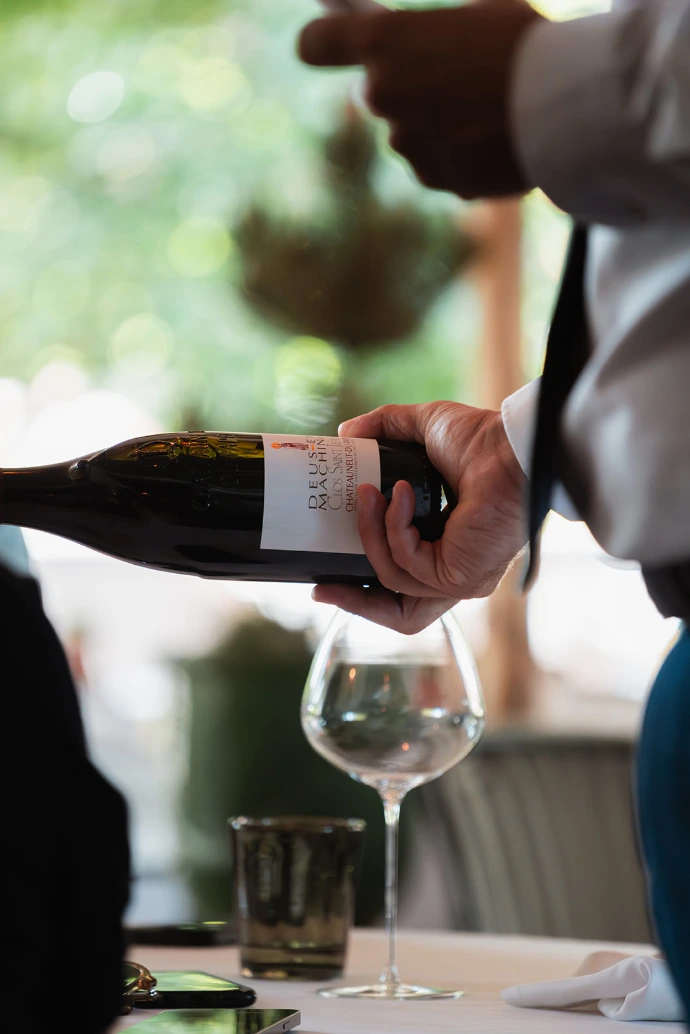 Wine being poured at the table